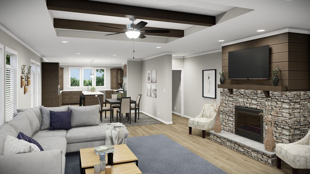 The HUXTON II Living Room. This Manufactured Mobile Home features 4 bedrooms and 2 baths.