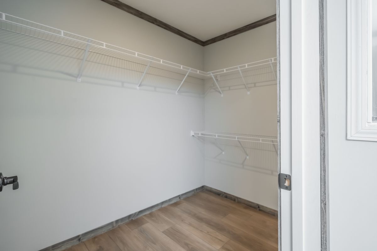 The THE JACKSON Storage. This Manufactured Mobile Home features 4 bedrooms and 2 baths.