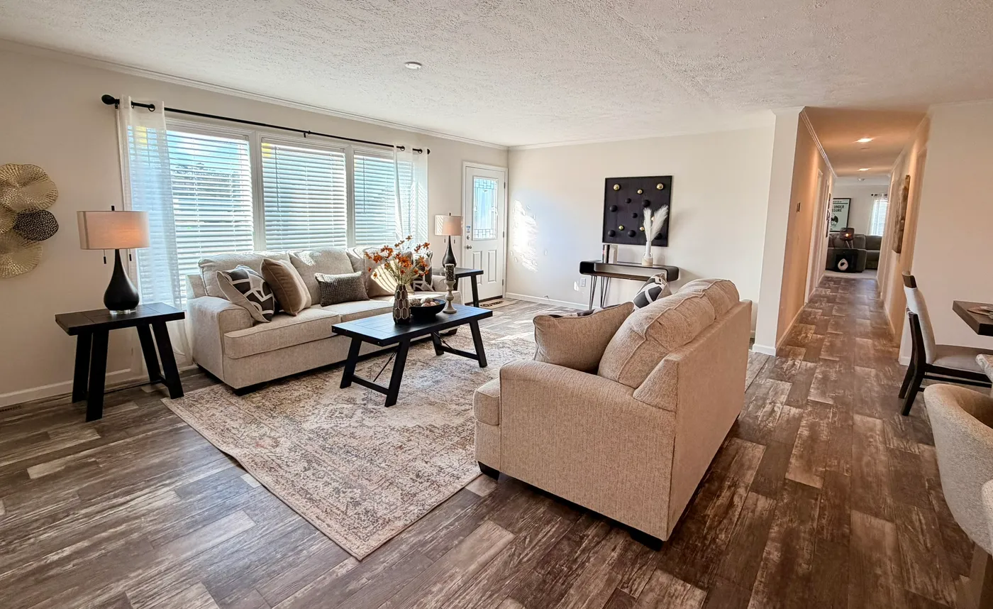 The TOURMALINE 7628-649 Living Room. This Manufactured Mobile Home features 4 bedrooms and 2 baths.