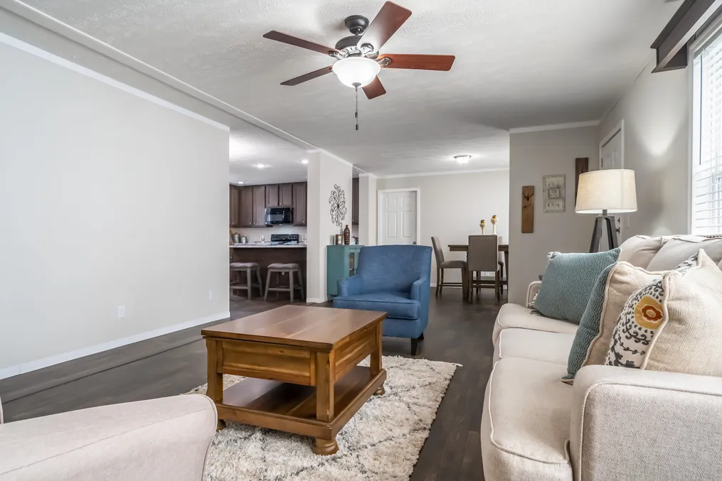 The MAVERICK 56A Living Room. This Manufactured Mobile Home features 3 bedrooms and 2 baths.
