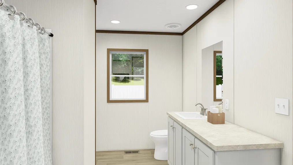 The SENSATION Primary Bathroom. This Manufactured Mobile Home features 3 bedrooms and 2 baths.