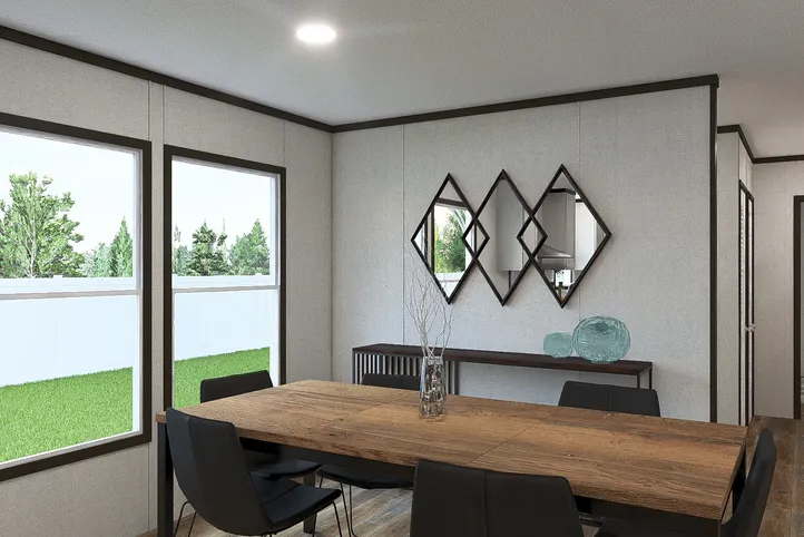 The OCCASION Dining Area. This Manufactured Mobile Home features 4 bedrooms and 2 baths.