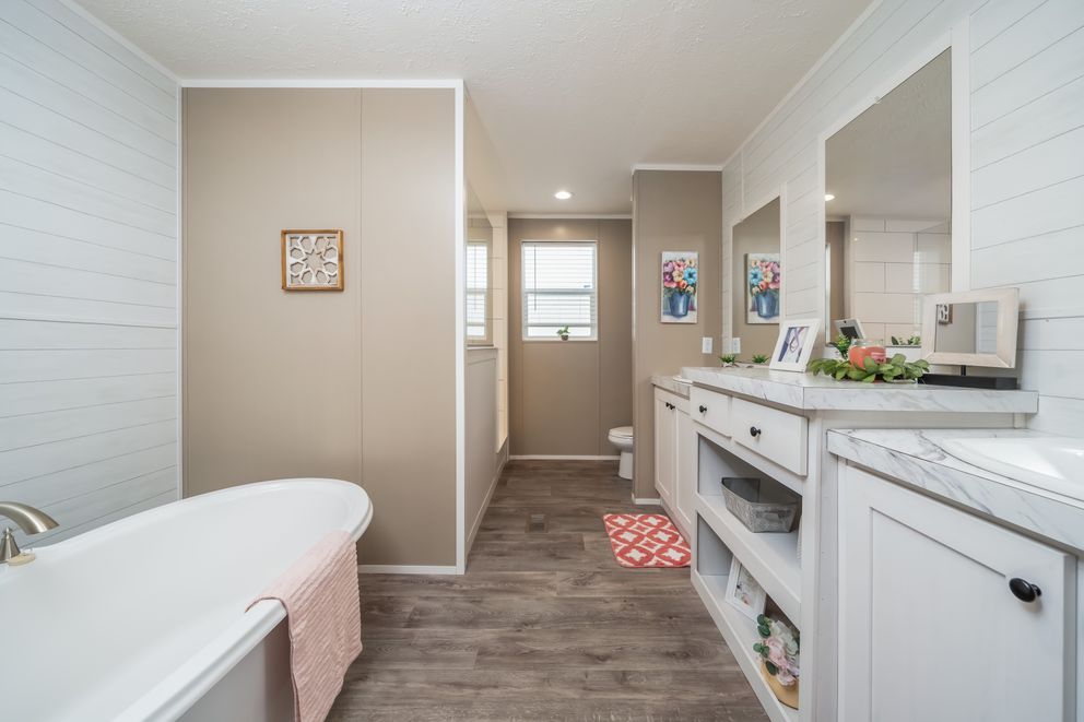 The ISLAND BREEZE Primary Bathroom. This Manufactured Mobile Home features 3 bedrooms and 2 baths.