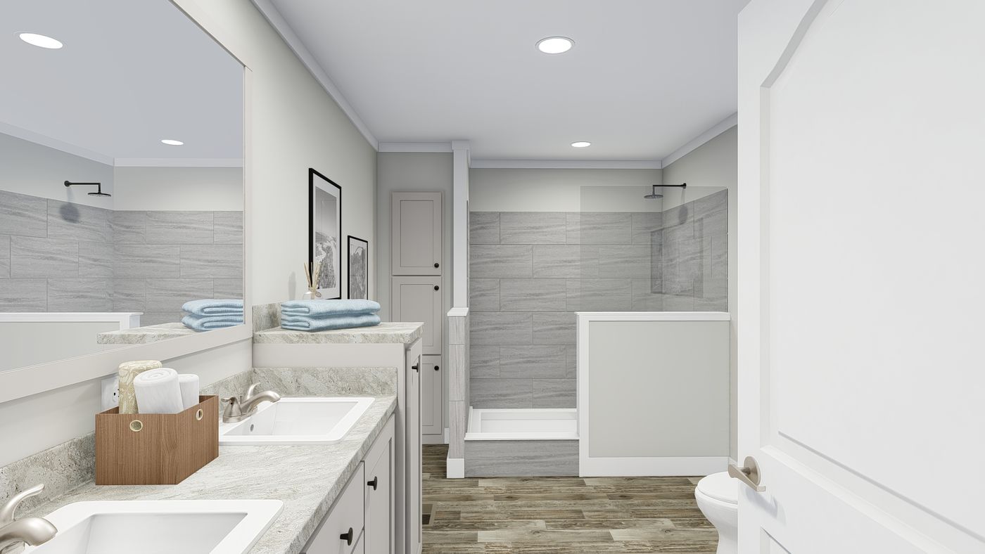 The BROOKLINE FLEX 32 WIDE Primary Bathroom. This Manufactured Mobile Home features 4 bedrooms and 3 baths.
