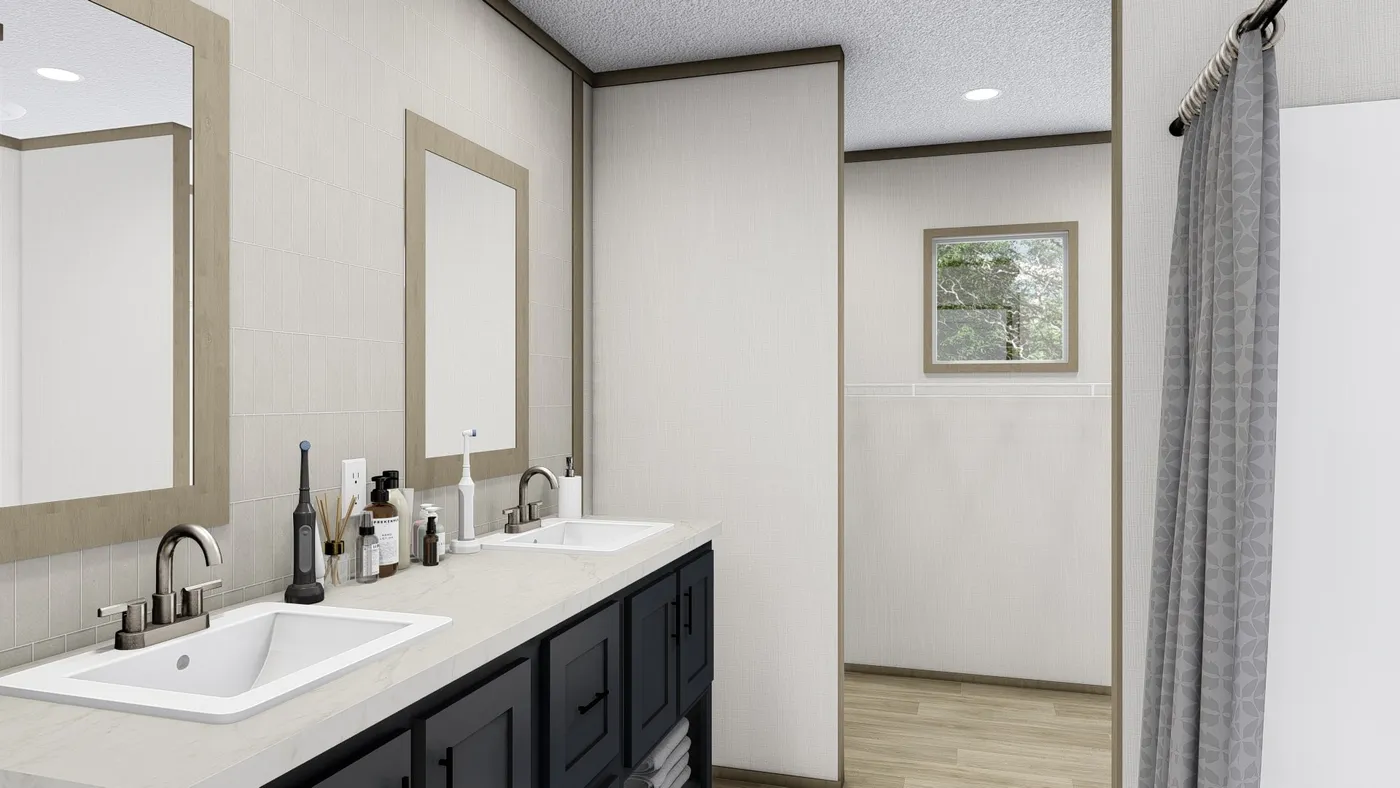 The BOONE Primary Bathroom. This Manufactured Mobile Home features 4 bedrooms and 2 baths.