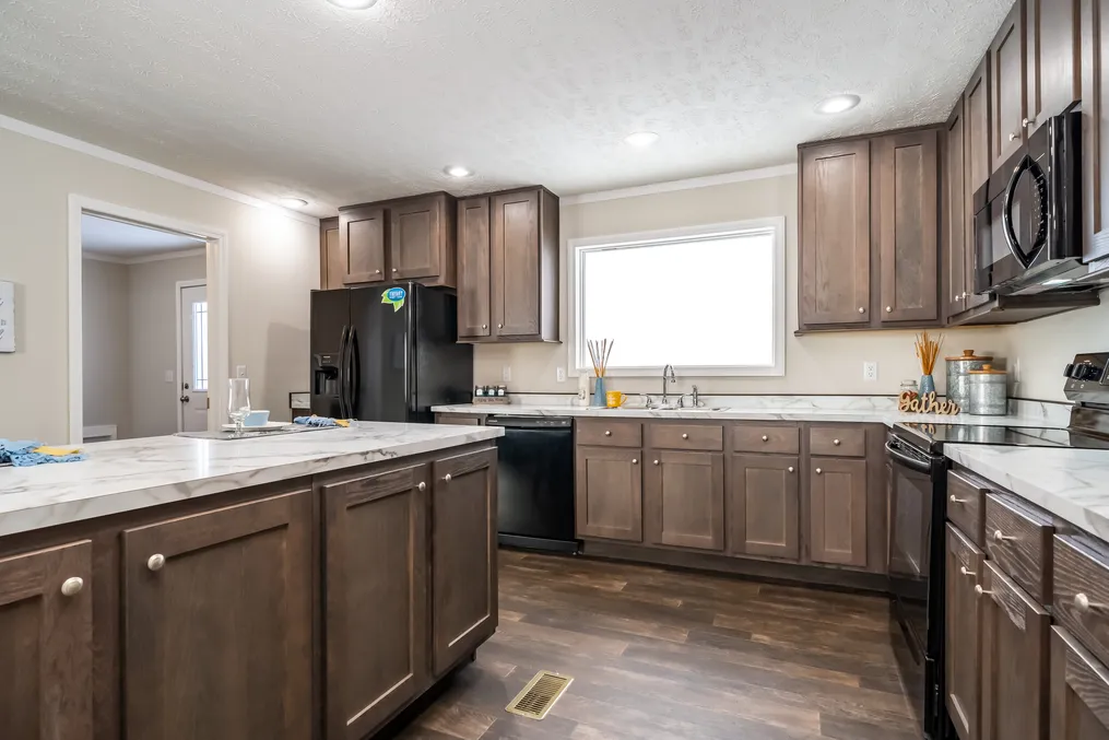 The MAVERICK 56A Kitchen. This Manufactured Mobile Home features 3 bedrooms and 2 baths.