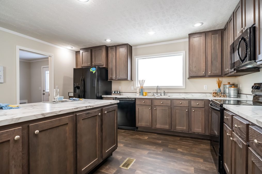 The MAVERICK 56A Kitchen. This Manufactured Mobile Home features 3 bedrooms and 2 baths.