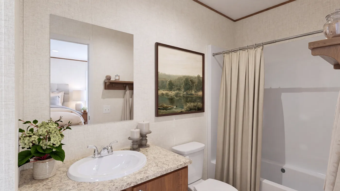 The CYPRESS Guest Bathroom. This Manufactured Mobile Home features 4 bedrooms and 2 baths.