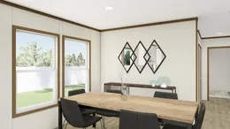 The THE OCCASION Dining Area. This Manufactured Mobile Home features 4 bedrooms and 2 baths.