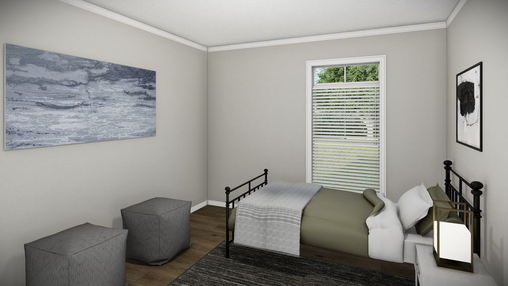 The HUXTON II Guest Bedroom. This Manufactured Mobile Home features 4 bedrooms and 2 baths.