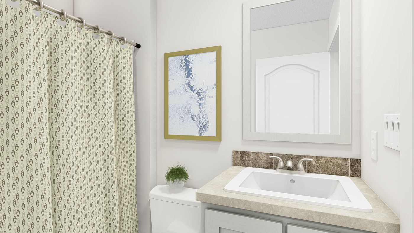 The RAMSEY 207-1 Guest Bathroom. This Manufactured Mobile Home features 3 bedrooms and 2 baths.