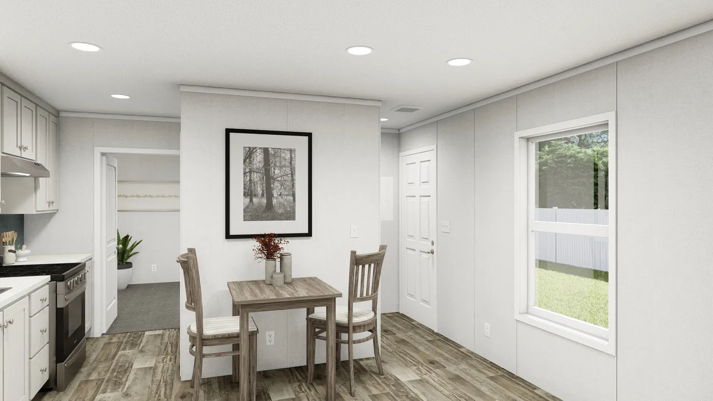 The SAPPHIRE Dining Area. This Manufactured Mobile Home features 3 bedrooms and 2 baths.