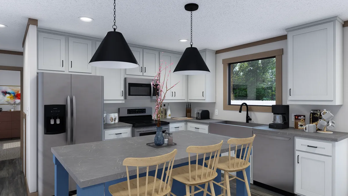The TRINITY 60 Kitchen. This Manufactured Mobile Home features 2 bedrooms and 2 baths.
