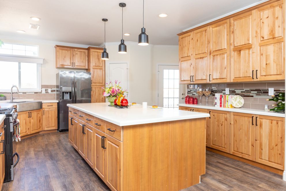 The SUM3076A Kitchen. This Manufactured Mobile Home features 4 bedrooms and 2.5 baths.