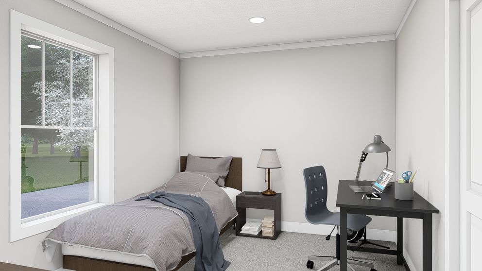 The SHOUT Bedroom. This Manufactured Mobile Home features 3 bedrooms and 2 baths.