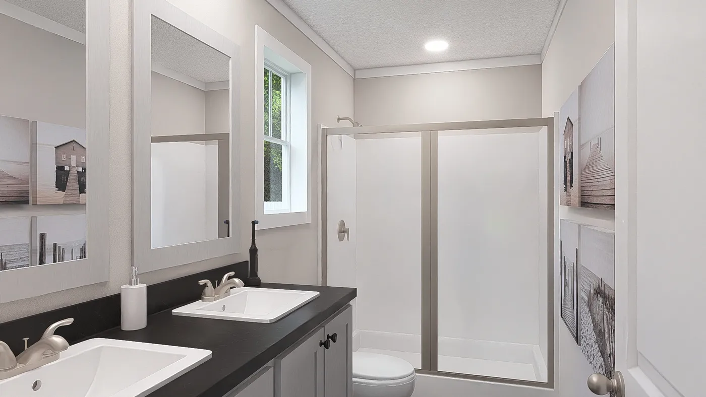 The MY GIRL Primary Bathroom. This Manufactured Mobile Home features 3 bedrooms and 2 baths.