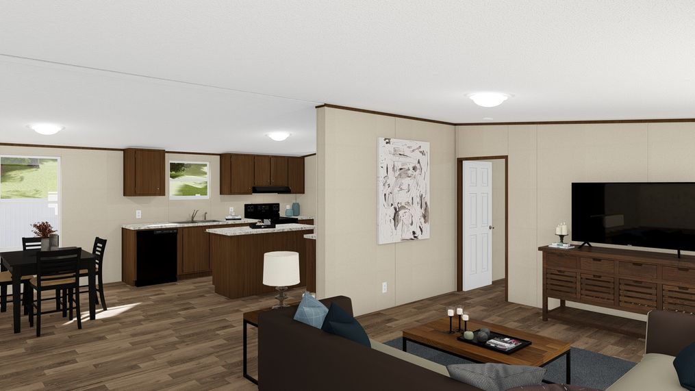 The SATISFACTION Living Room. This Manufactured Mobile Home features 3 bedrooms and 2 baths.