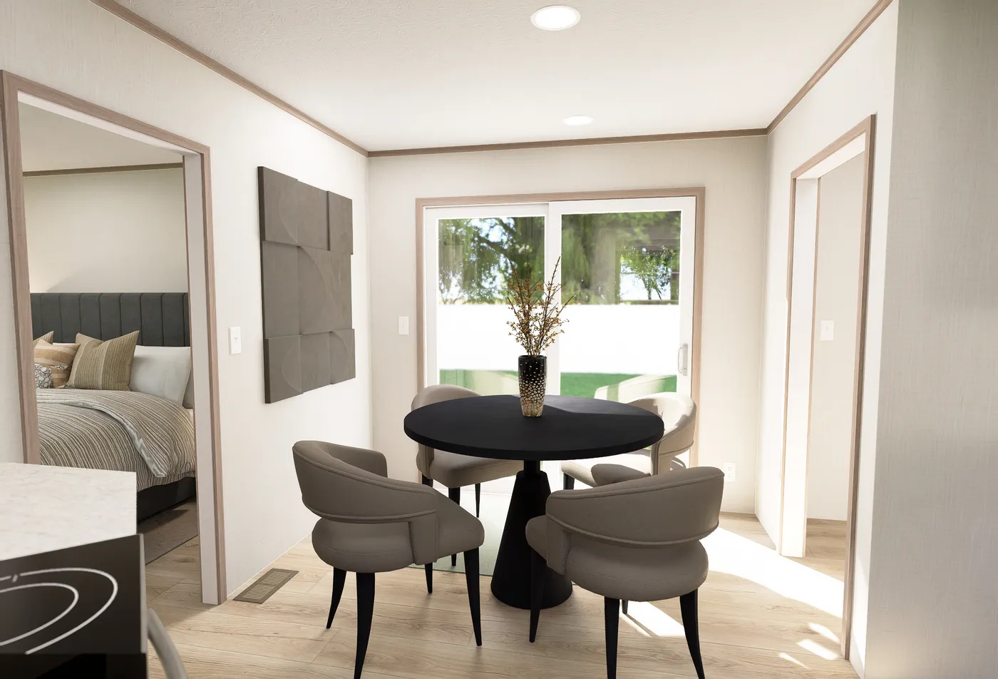 The ULTRA FLEX ANNIVERSARY PLUS Dining Area. This Manufactured Mobile Home features 3 bedrooms and 2 baths.