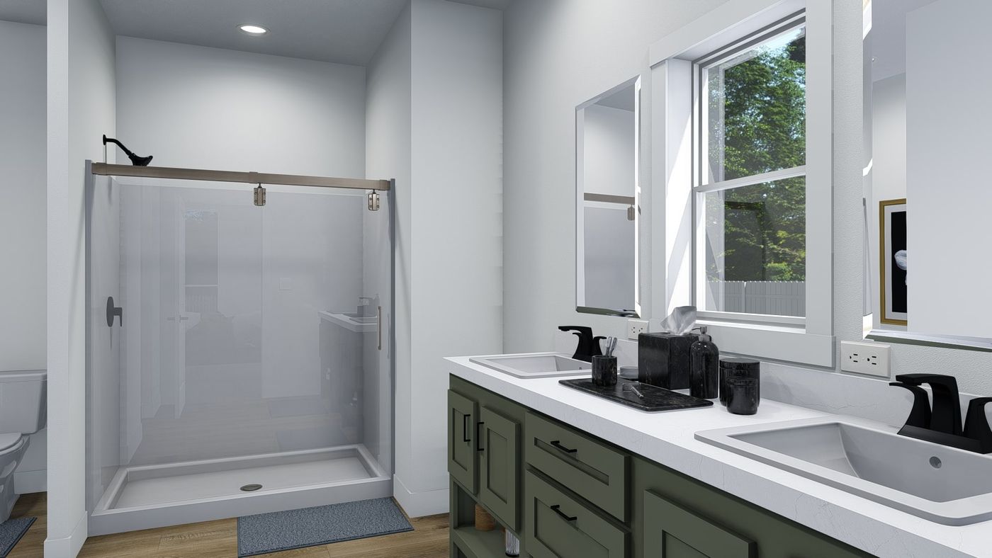 The JOSHUA Primary Bathroom. This Manufactured Mobile Home features 4 bedrooms and 2 baths.