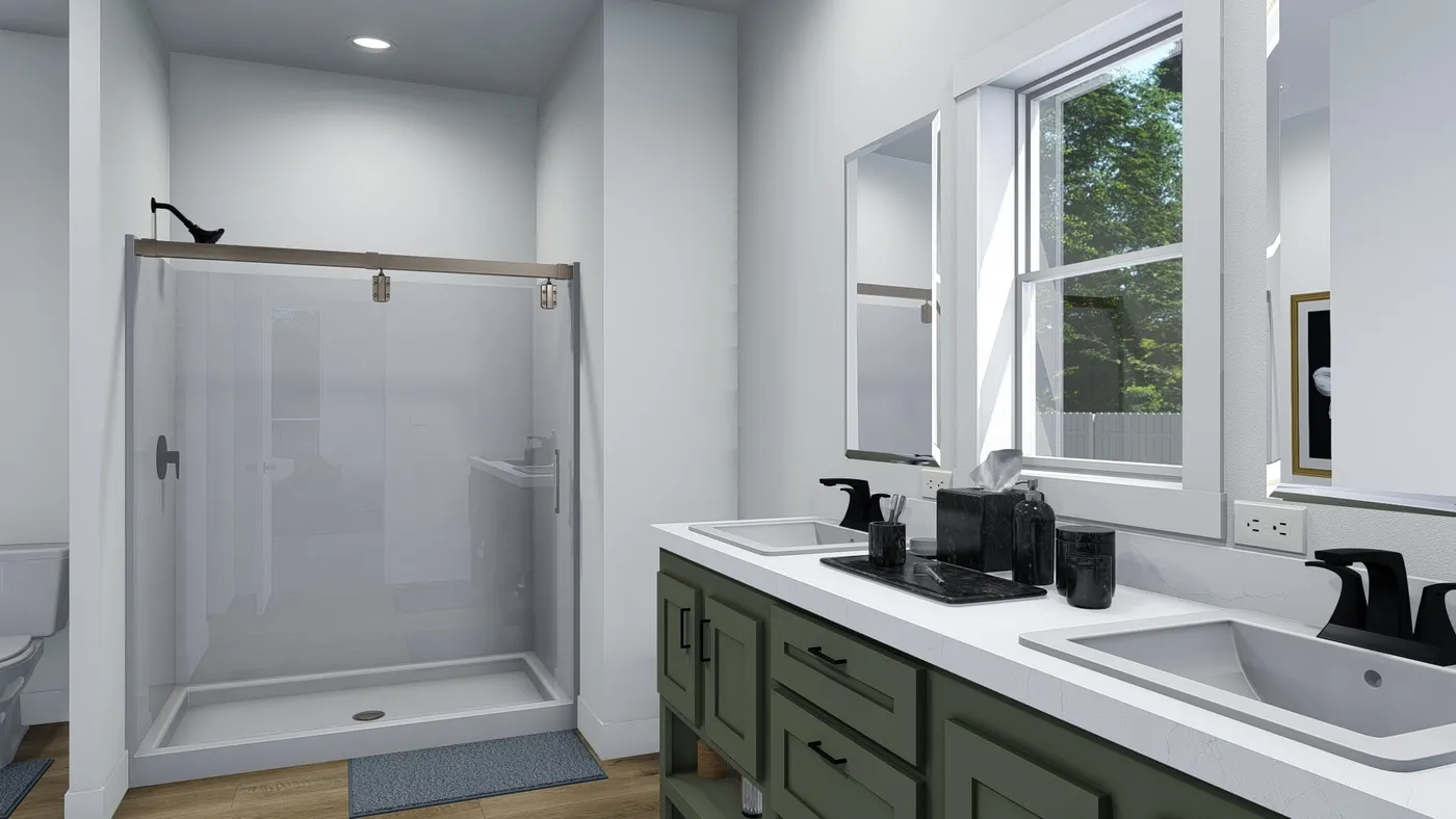 The JOSHUA Primary Bathroom. This Manufactured Mobile Home features 4 bedrooms and 2 baths.