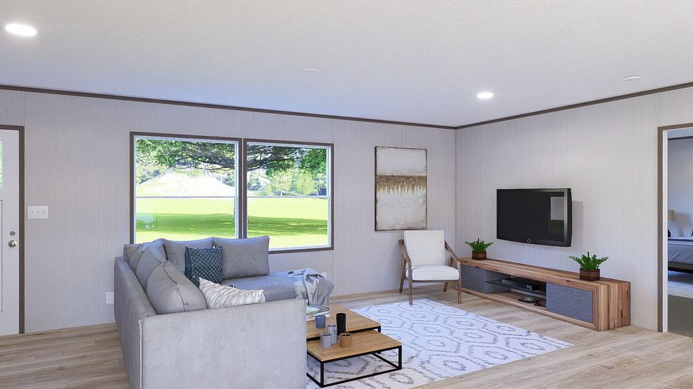 The ULTRA PRO HERCULES 28X68 3BR Living Room. This Manufactured Mobile Home features 3 bedrooms and 2 baths.