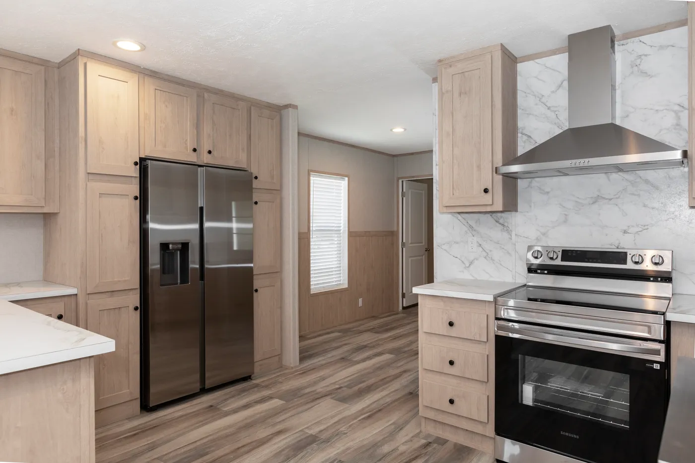 The THE THUNDERHEAD Kitchen. This Manufactured Mobile Home features 3 bedrooms and 2 baths.