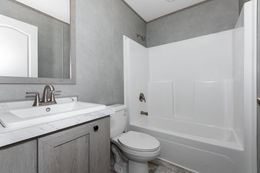 The SHOWER HOUSE Guest Bathroom. This Manufactured Mobile Home features 3 bedrooms and 2 baths.