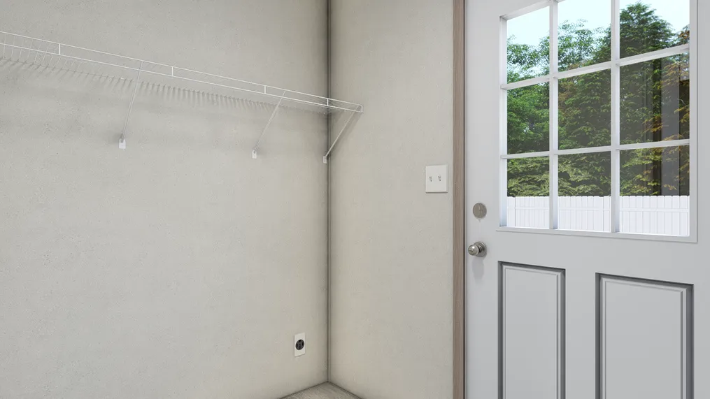 The 7616-4700 THE PULSE Utility Room. This Manufactured Mobile Home features 3 bedrooms and 2 baths.