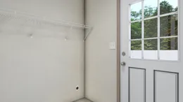 The 7616-4700 THE PULSE Utility Room. This Manufactured Mobile Home features 3 bedrooms and 2 baths.