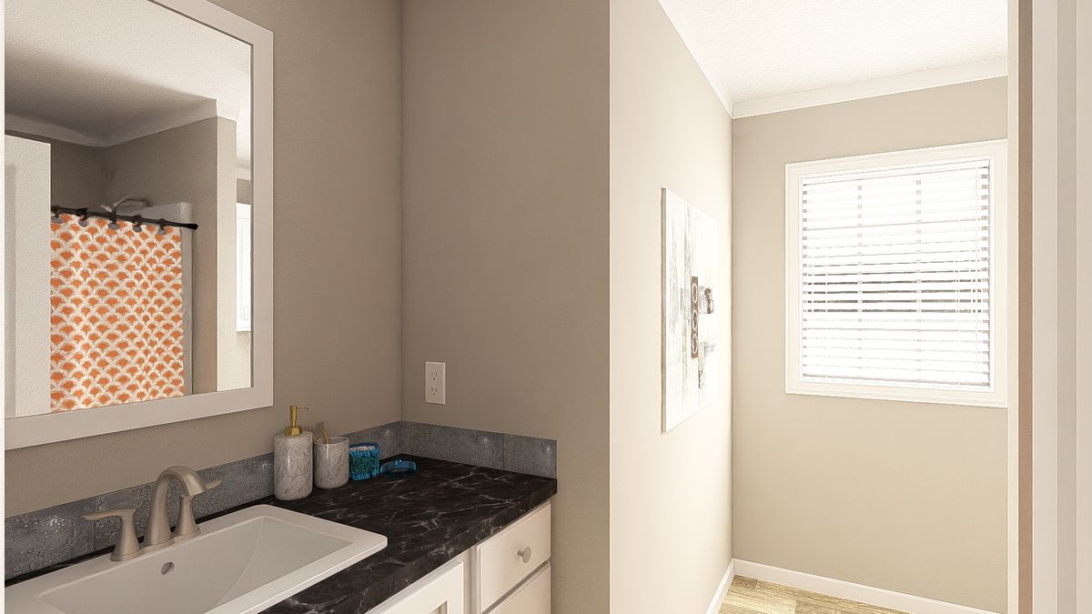 The THE BIG EASY Guest Bathroom. This Manufactured Mobile Home features 4 bedrooms and 3 baths.