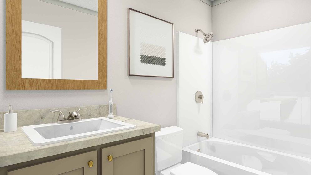 The ABBEY ROAD Guest Bathroom. This Manufactured Mobile Home features 3 bedrooms and 2 baths.