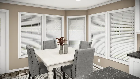 The THE MAVERICK Dining Area. This Manufactured Mobile Home features 3 bedrooms and 2 baths.