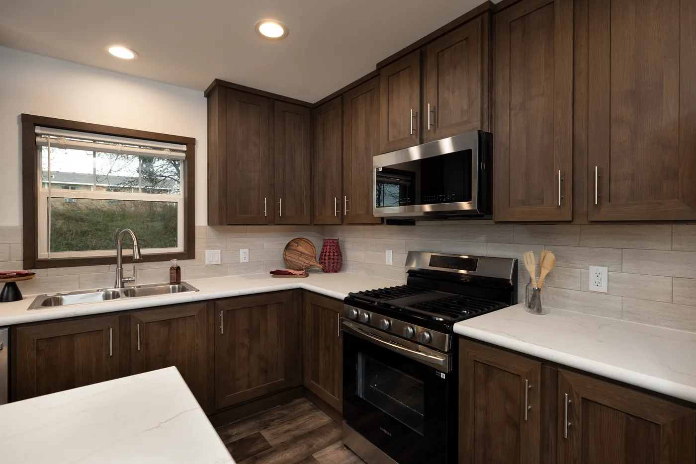 The RAMSEY 75 Kitchen. This Manufactured Mobile Home features 4 bedrooms and 2 baths.