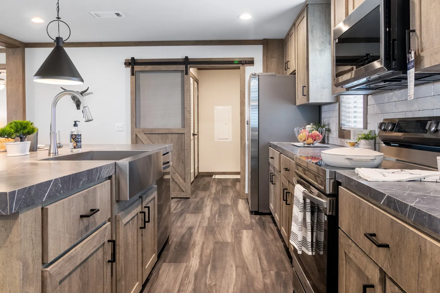 The ISABELLA ELITE Living Room. This Manufactured Mobile Home features 3 bedrooms and 2 baths.