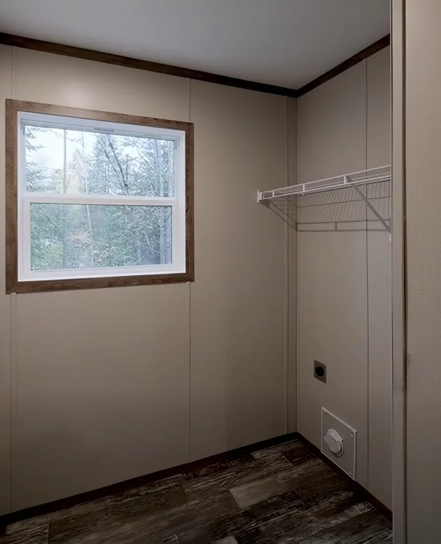 The PERIDOT Utility Room. This Manufactured Mobile Home features 2 bedrooms and 1 bath.