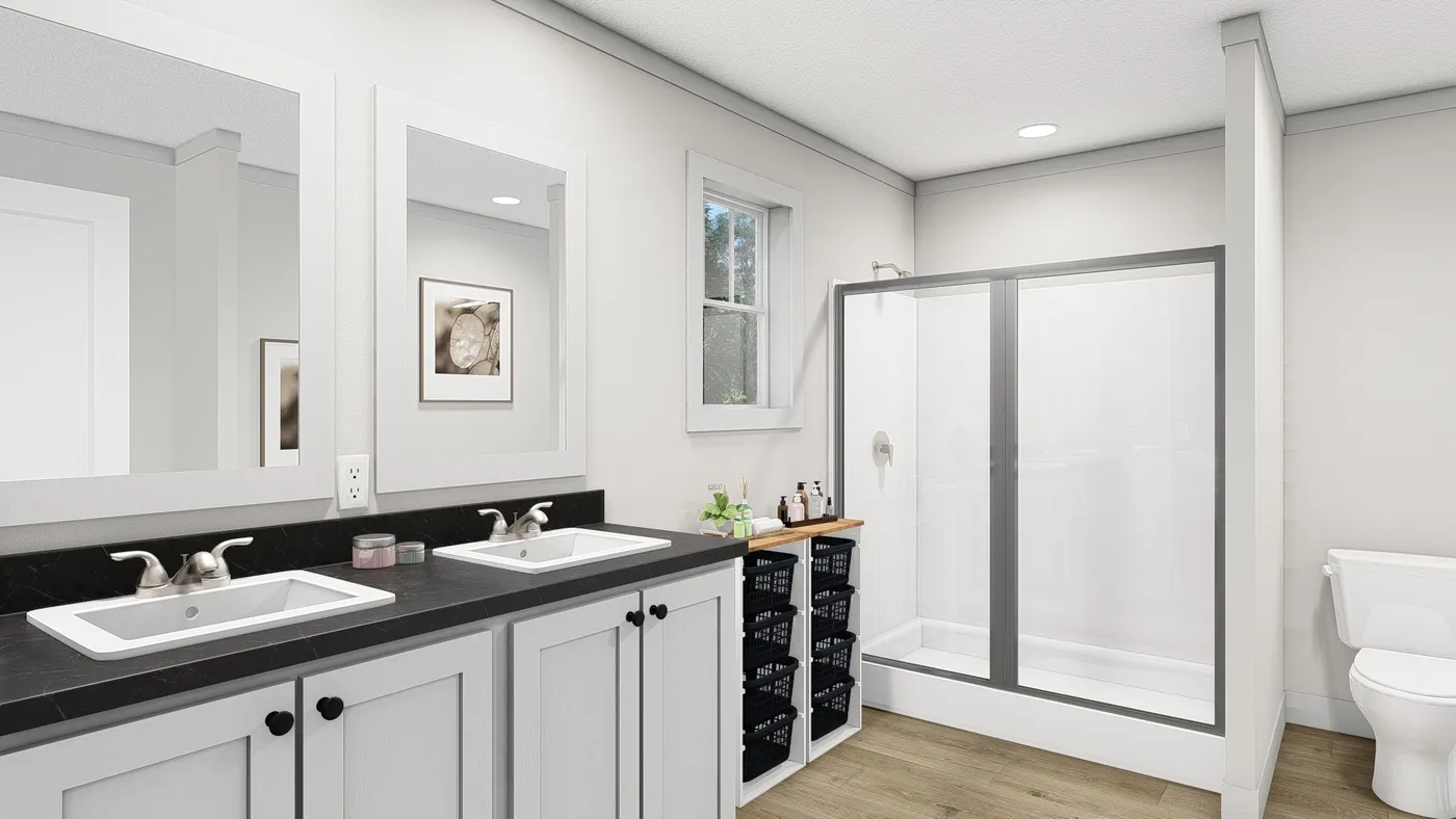 The ROCKET MAN Primary Bathroom. This Manufactured Mobile Home features 3 bedrooms and 2 baths.