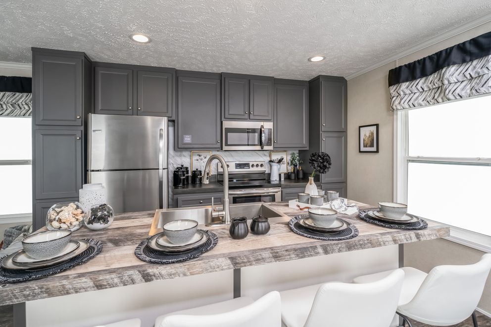 The RIVERVIEW Exterior. This Manufactured Mobile Home features 2 bedrooms and 2 baths.