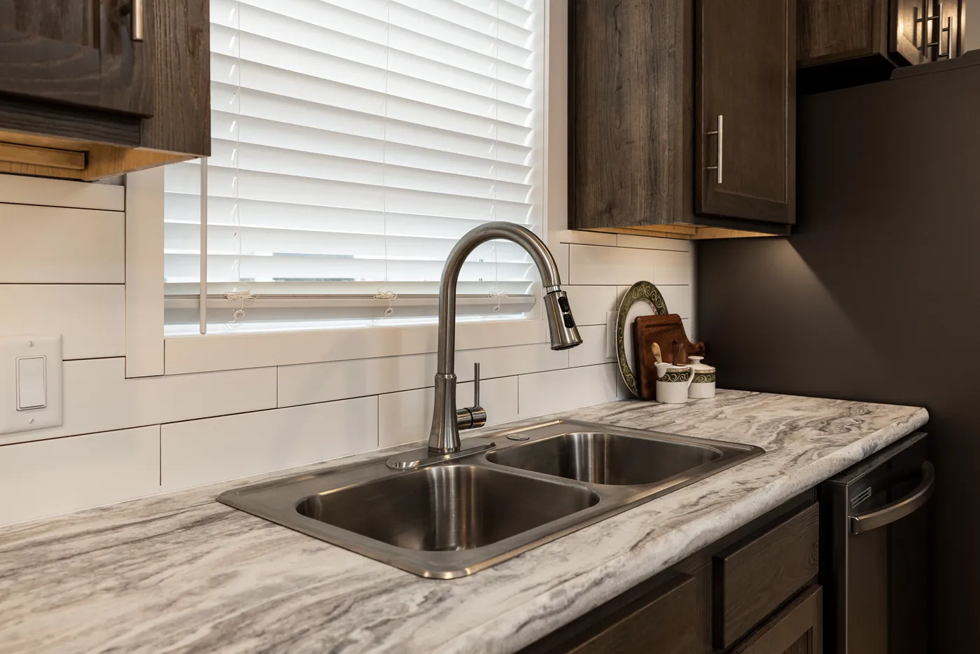 The RAMSEY 217-1 Kitchen. This Manufactured Mobile Home features 3 bedrooms and 2 baths.