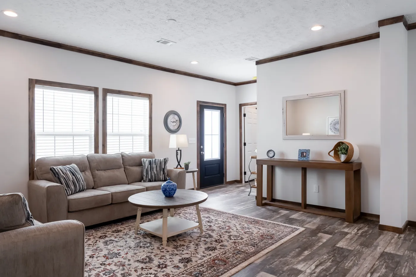 The 3237 THE TYBEE HUD Living Room. This Manufactured Mobile Home features 4 bedrooms and 3 baths.