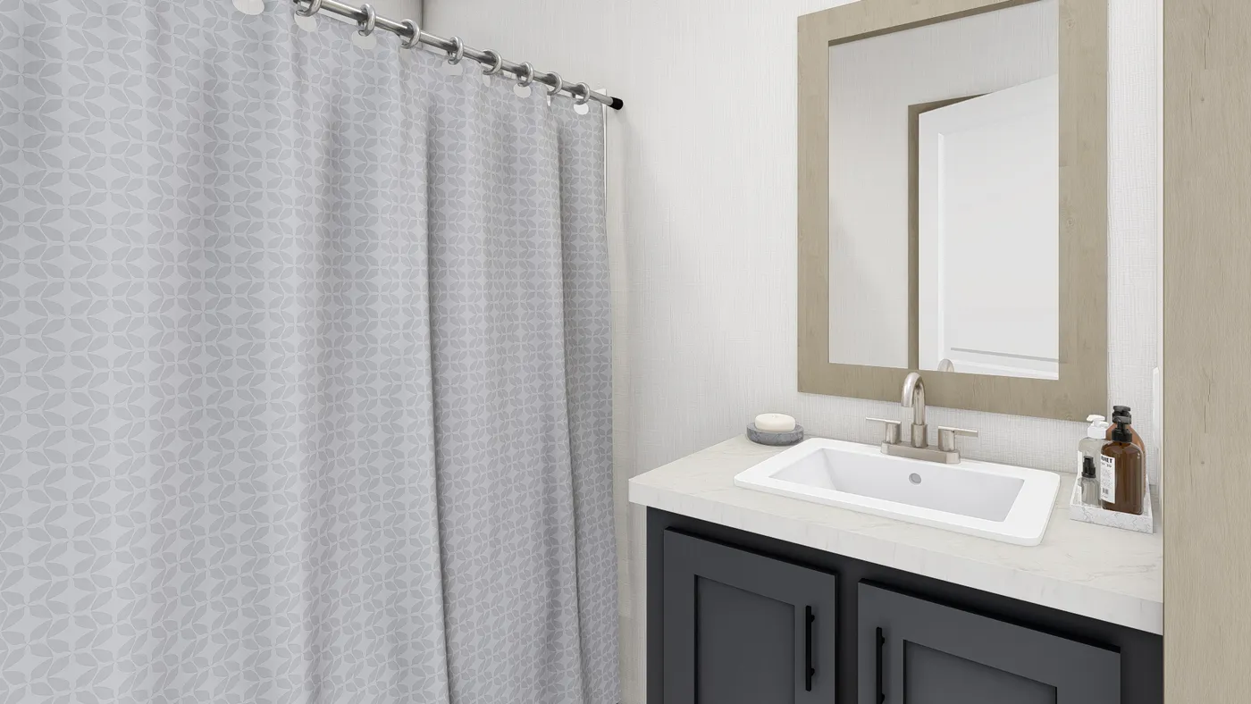 The LEWIS Guest Bathroom. This Manufactured Mobile Home features 2 bedrooms and 2 baths.