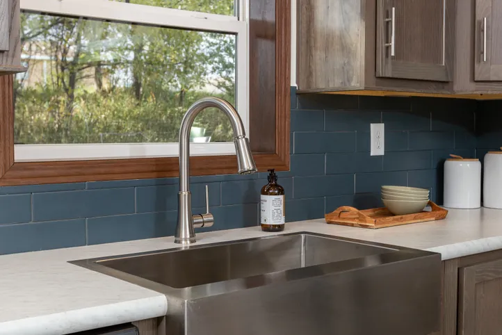 The LEGEND 86 Kitchen. This Manufactured Mobile Home features 3 bedrooms and 2 baths.