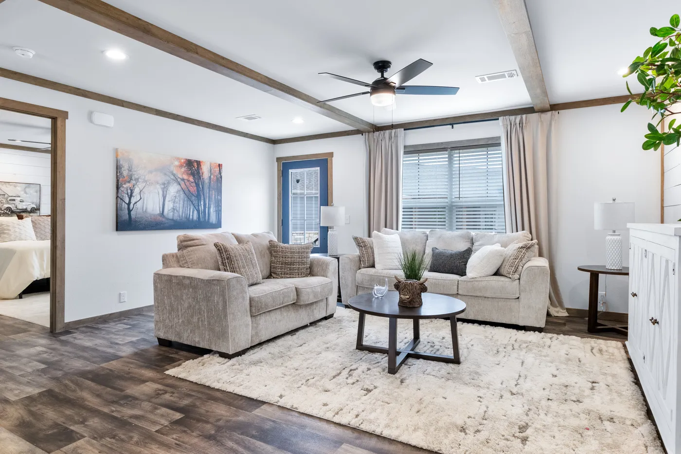 The SAWYER ELITE Living Room. This Manufactured Mobile Home features 3 bedrooms and 2 baths.