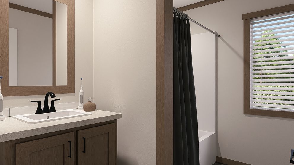 The FARM 3 FLEX Guest Bathroom. This Manufactured Mobile Home features 3 bedrooms and 2 baths.