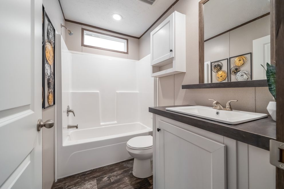 The THE GENERAL Exterior. This Manufactured Mobile Home features 3 bedrooms and 2 baths.