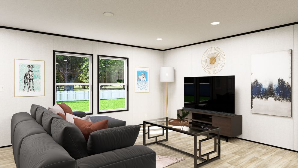 The SOLACE Living Room. This Manufactured Mobile Home features 4 bedrooms and 2 baths.