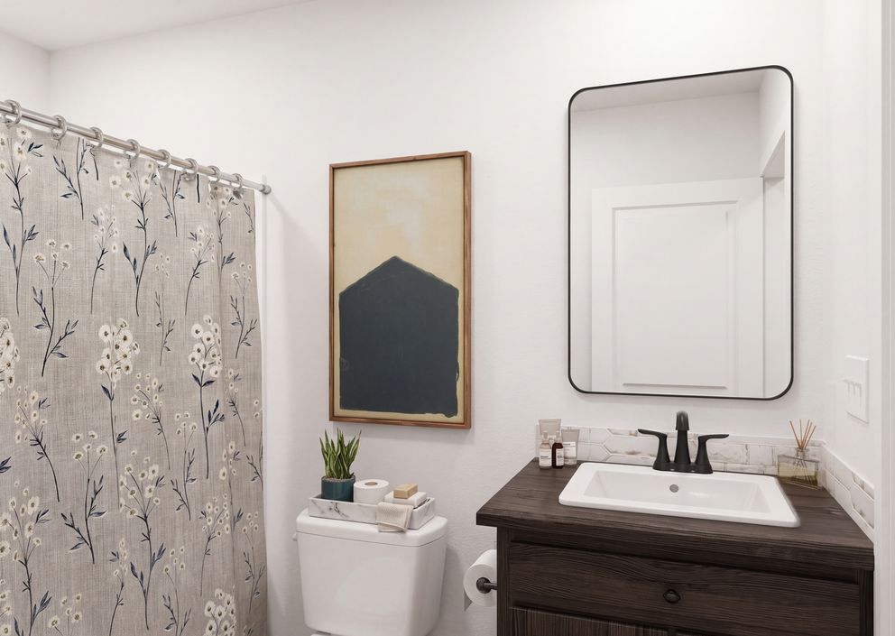 The THE ROOSEVELT Guest Bathroom. This Manufactured Mobile Home features 4 bedrooms and 3 baths.