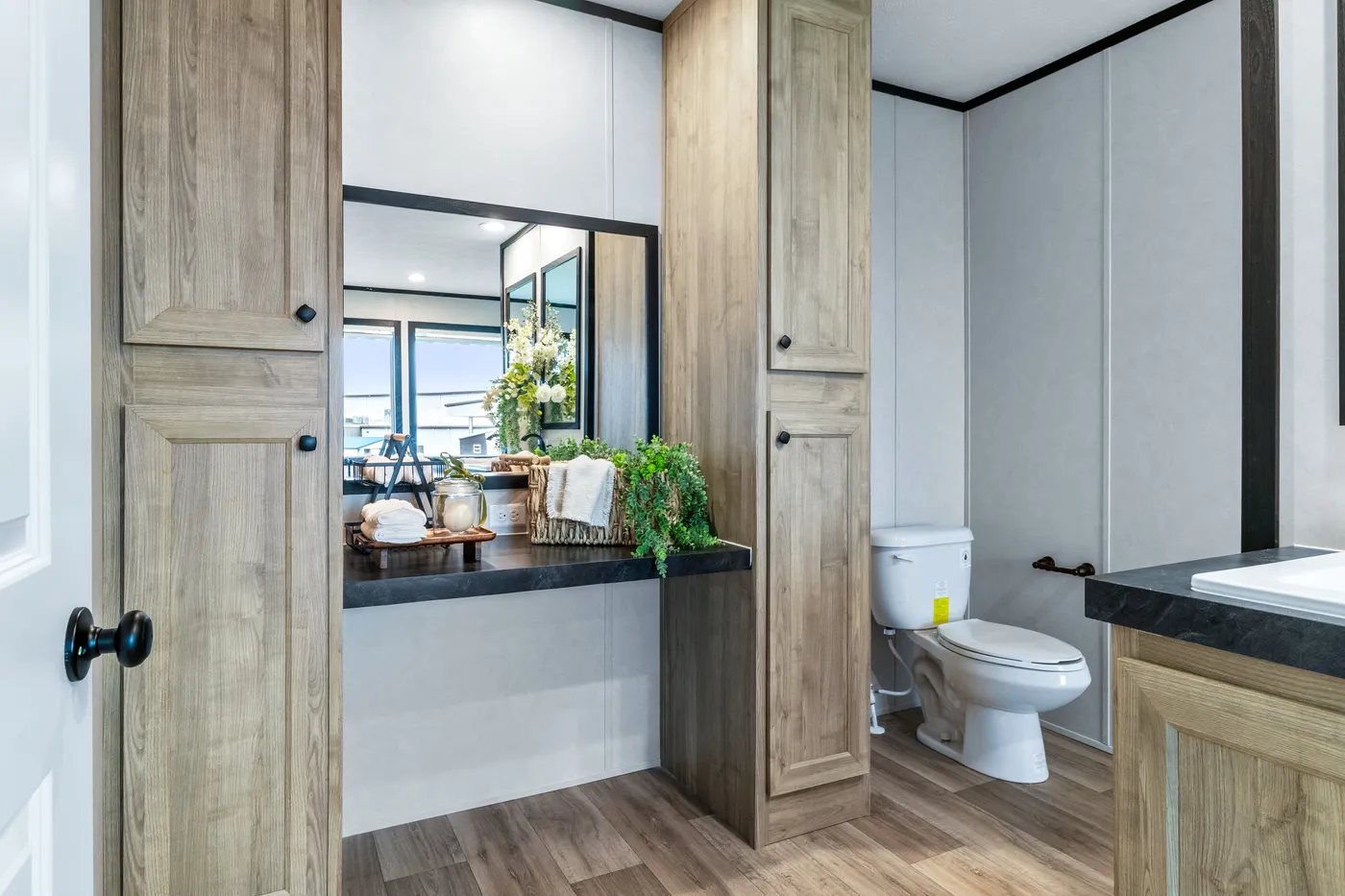 The ODYSSEY Primary Bathroom. This Manufactured Mobile Home features 4 bedrooms and 2 baths.