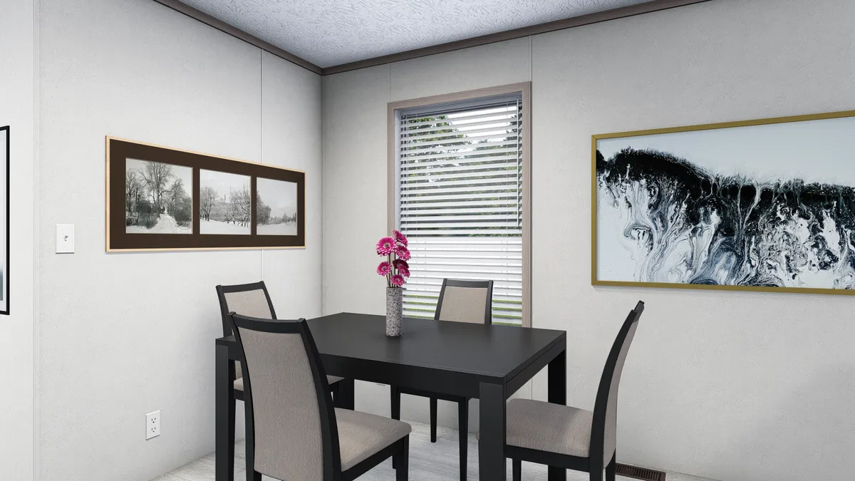 The 7614-4701 THE PULSE Dining Area. This Manufactured Mobile Home features 3 bedrooms and 2 baths.