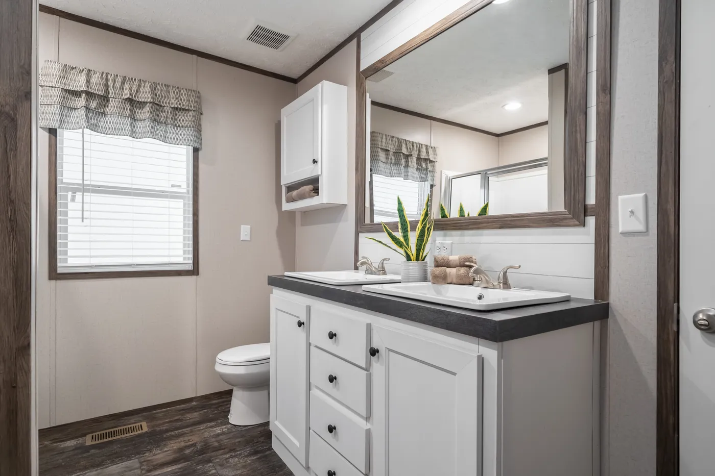 The THE GENERAL Primary Bathroom. This Manufactured Mobile Home features 3 bedrooms and 2 baths.