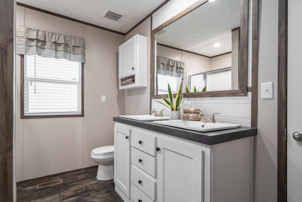 The THE GENERAL Primary Bathroom. This Manufactured Mobile Home features 3 bedrooms and 2 baths.